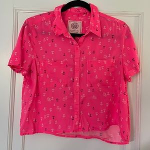Hot pink button up shirt with white and navy anchors